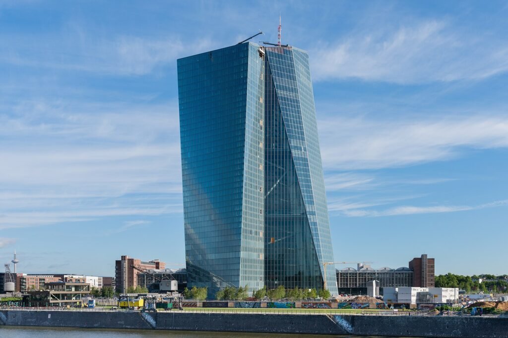European Central Bank headquarters building in Frankfurt with euro sculpture